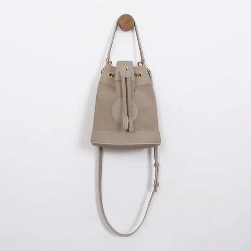 rio shoulder light beige bucket bag